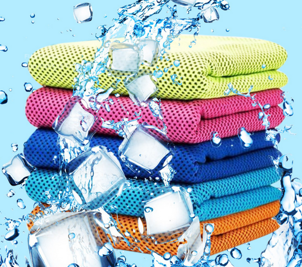 CoolPro Sports Towel in blue, folded in a stack of five towels, including red, green, blue, and pink variations
